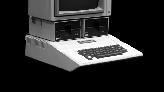 Ordenador Apple II con monitor y dos unidades de disquete Disk II