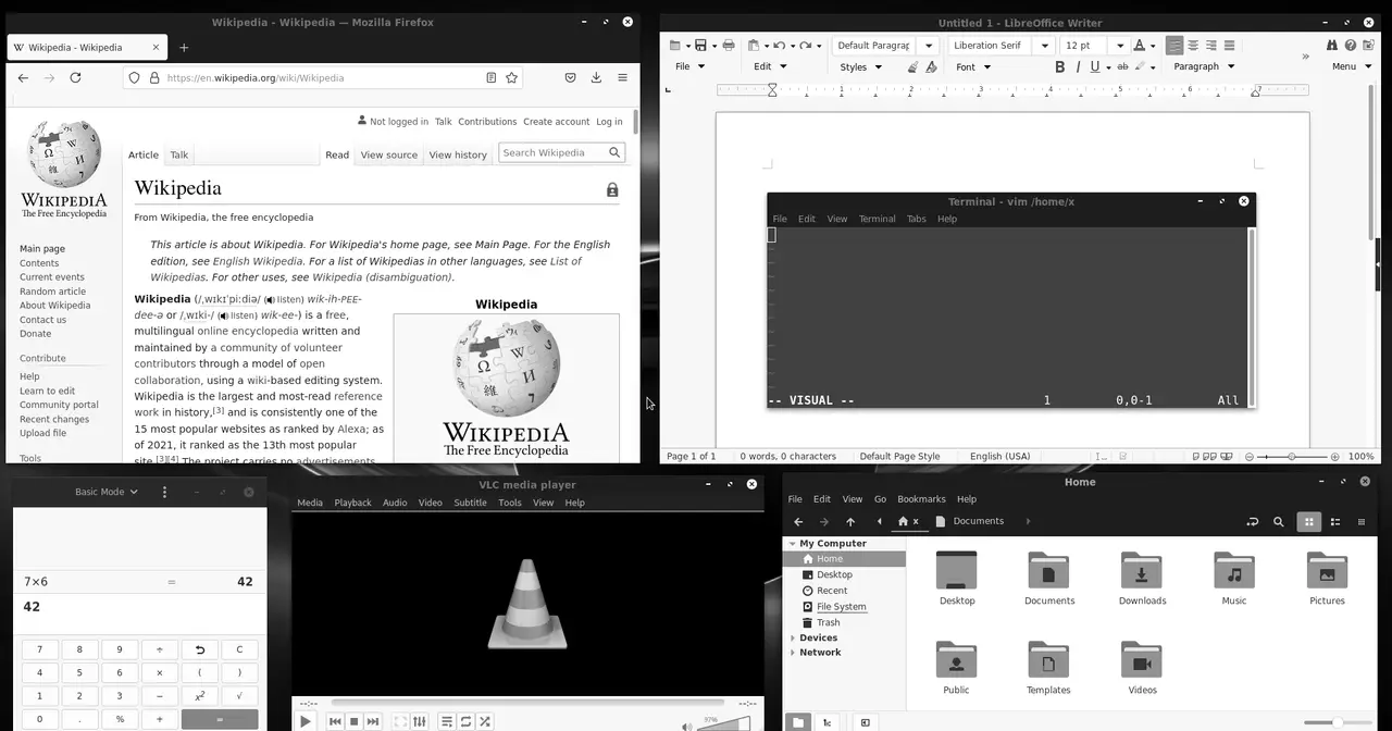 Escritorio de Manjaro Linux con varias aplicaciones de código abierto abiertas